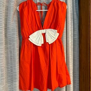 Vibrant Orange Dress with White Bow